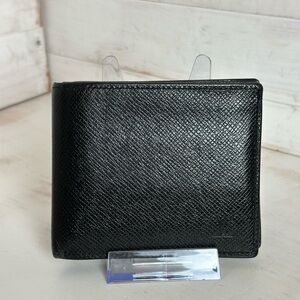 Louis Vuitton Portegeuille Taiga Amerigo Wallet in Black Tiaga Leather